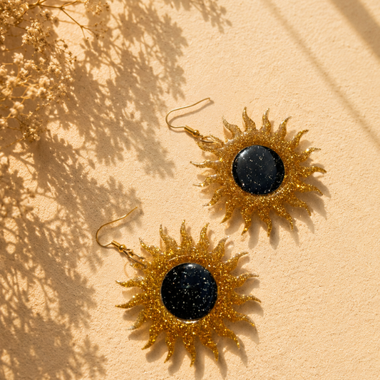 Les boucles d'oreilles Solaire
