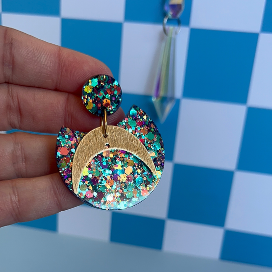 Les boucles d’oreilles Scintia