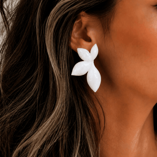 Les boucles d'oreilles Vénus