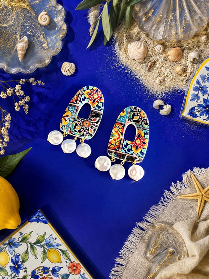 Les boucles d'oreilles Lagoa