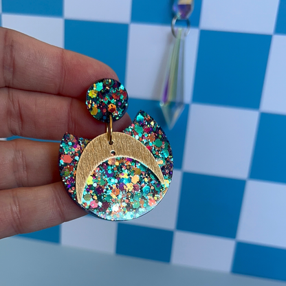 Les boucles d’oreilles Scintia