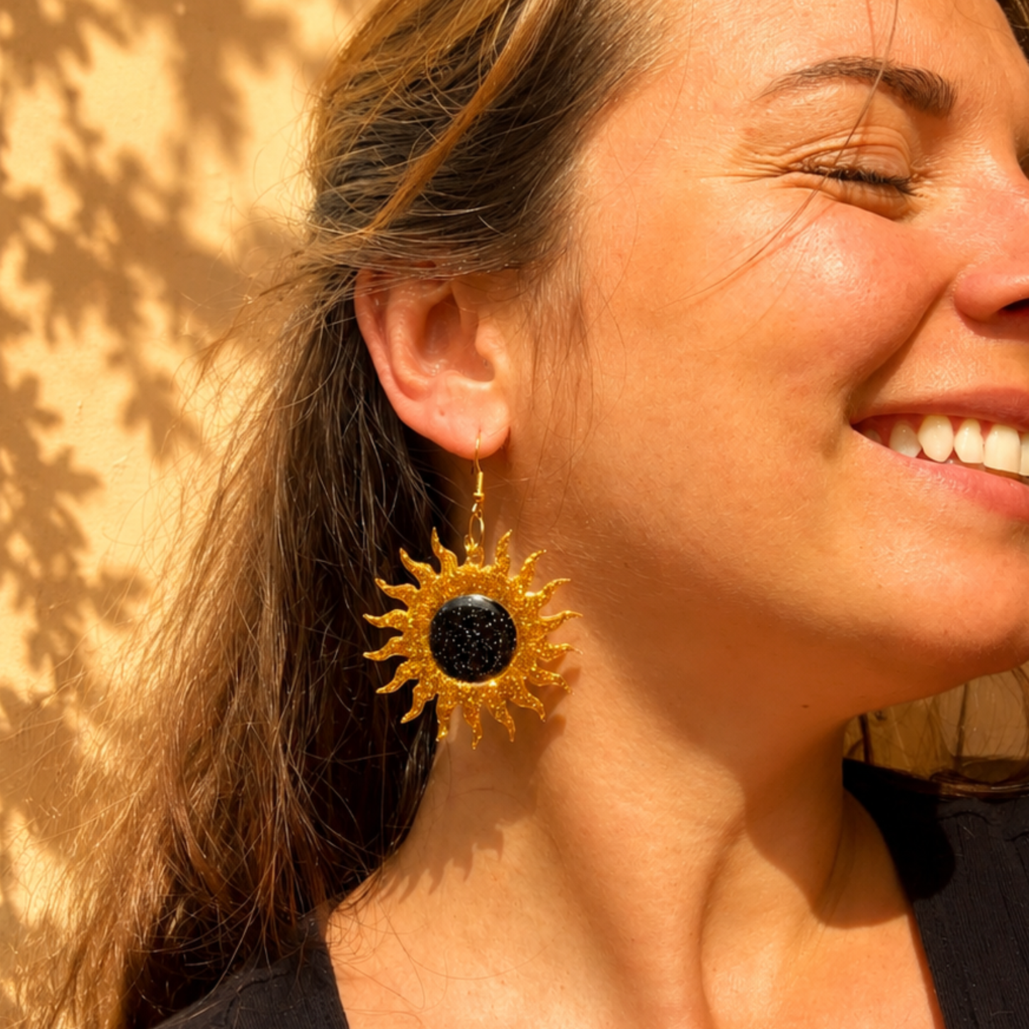 Les boucles d'oreilles Solaire