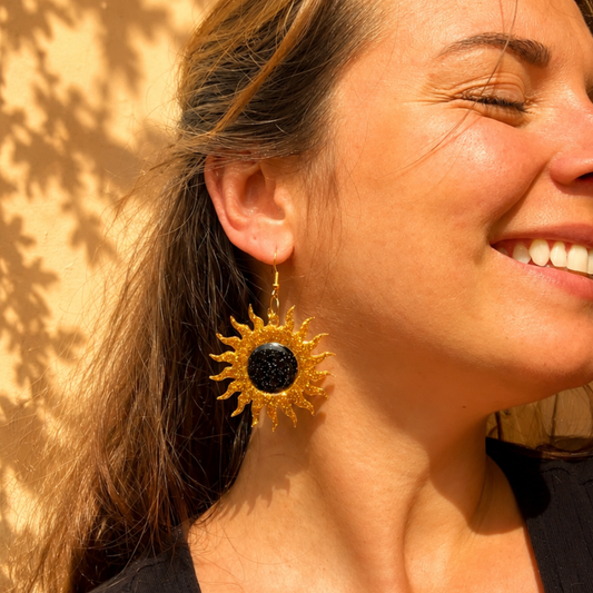 Les boucles d'oreilles Solaire